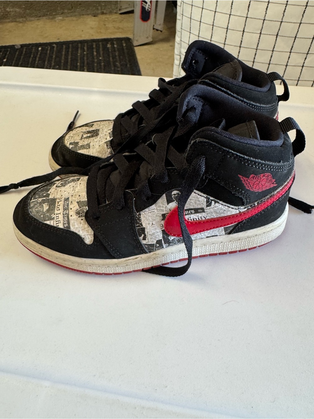 Jordan Kids Black White Red Newspaper Print High Top Sneakers